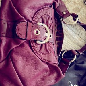 Pocketbook brand new B Makowsky maroon -Grape color  has bag paid 299